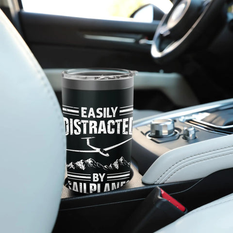 Glider Pilot Stainless Steel Insulated Tumbler For Sailplane Enthusiasts And Aviation Fans on car console.