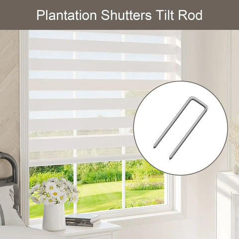 Forty Pieces Zinc Plated Louver Staples For Plantation Shutters Tilt Rods Precision Fit rust proof clip displayed near window.