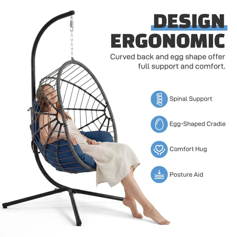 Woman relaxing on Hanging Egg Chair With Stand For Indoor And Outdoor Relaxation And Kick Back Vibe 350 Lb Capacity Waterproof PE Rattan With Cushions.