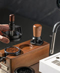 Game Changing 58mm Espresso Puck Distributor Tool With Adjustable Height and Eight Precision Needles used for leveling coffee grounds.