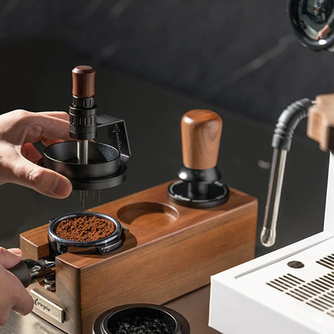 Game Changing 58mm Espresso Puck Distributor Tool With Adjustable Height and Eight Precision Needles used for leveling coffee grounds.