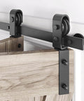64 Inch Bifold Sliding Barn Door Hardware Track Kit With Side Mounted Black J Shape Rollers For Ultra Quiet Smooth Glide Easy Assembly Fits Double 30 Inch Bi Folding Doors Door Not Included close-up view