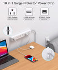 Two Pack Six Outlet Surge Protector Power Strip With Four USB Ports Including Two USB C Ports, mounted on a desk, charging devices.