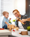 Basswood sheets 12x18x1/8 in, 10-pack; front view with man and child building wooden toys at a table