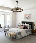 Beaded Wood Chandelier With 6 Candle Lights Rustic Farmhouse Pendant Ceiling Light in black above bed in modern bedroom decor.