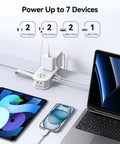 Slick Travel Power Strip With Four AC Outlets And Three USB Ports Including One USB C Connector Pd 20W fast charging with devices connected.