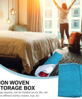No Fuss Heavy Duty Folding Clothes Storage Bin With Sturdy Handles And Smart Compartments For Bed Sheets Blankets And Closets, shown in a bedroom.