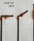 Close-up of flip-up arm mechanism on Free Standing Toilet Paper Holder Stand For 4 Rolls In Matte Black Stainless Steel