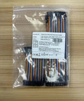 10cm And 20cm Breadboard Jumper Wires Kit, 240 Pcs in plastic packaging on wooden surface