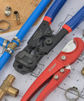 All In One Ratchet PEX Cinch Tool With Remove Function For Three Eighths To One Inch Stainless Steel Clamps Includes Twenty Half Inch And Ten Three Quarter Inch PEX Clamps Plus Pipe Cutter A Real Workhorse For Fast Clean Clamp Success on blueprint with pipes and fittings