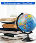 Hands On 6 Inch World Globe For Kids With Stand Interactive 360 Degree Earth Globe on a desk beside stacked books.