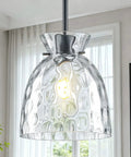 7.5" Black Hammered Glass Pendant Lights Kitchen Island Lighting 1 Pack E26 clear glass shade illuminated in indoor setting.