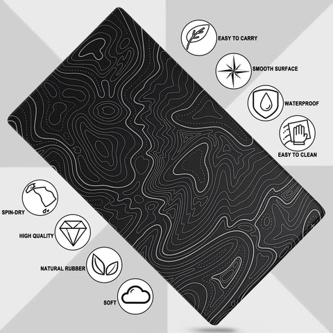 Extra Large Waterproof Gaming Mouse Pad With Stitched Edges 31.5 Inch By 15.7 Inch featuring black design and icons indicating easy to carry, smooth surface, waterproof, easy to clean, made of natural rubber, soft, and high quality.