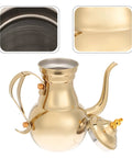 Golden Stainless Steel Turkish Coffee Pot Cezve Style For Rich Stovetop Brews At Home Pro-Grade Barista Finish With Even Heat Distribution And Easy Pour Spout 1 Count, featuring a shiny body and spout with an open lid.