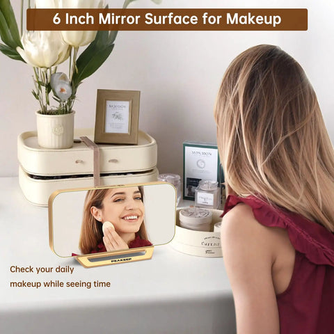 Slim Digital Mirror Alarm Clock With Gold Finish Dope LED Display features in bedroom with woman, cosmetics, and mirror use