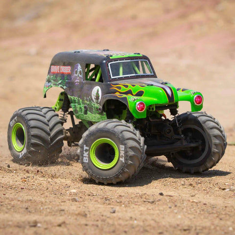 Grave Digger 1 To 18 Scale Mini LMT 4X4 RC Monster Truck RTR with BKT tires and LED headlights in action on dirt track