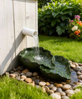 Dual Leaf Decorative Splash Block And Gutter Downspout Rain Diverter Extension For Lawn Patio Yard Garden Heavy Duty Weatherproof No Hassle backyard kickback to shield foundation smooth water flow with downspout and stones.