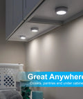 Under Cabinet LED Puck Lights Wireless Battery Operated Touch Activated Stick On Lighting illuminating under kitchen cabinets