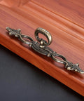 Vintage Style Antique Bronze Cabinet Pulls Handles 2 Pack Hollow Decor on wooden surface