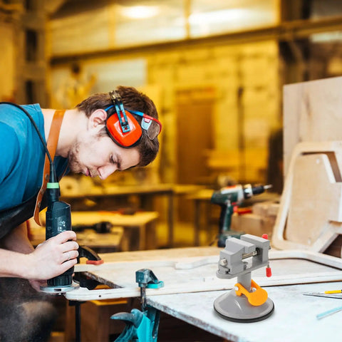 360 Degree Swivel Bench Vise With Quick Release Table Clamp for Metalworking and DIY Projects shown on a workbench