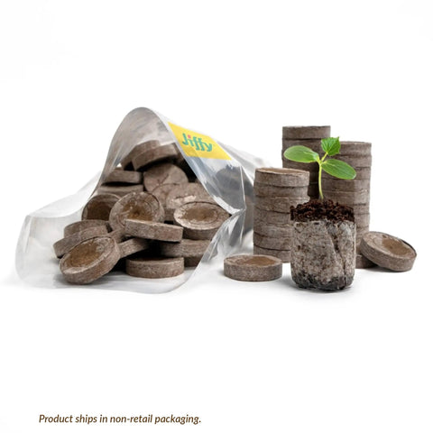 Indoor Seed Starter Kit with 100 36mm peat pellets expanding with water, promoting fuss-free germination for vegetables, herbs, and flowers.