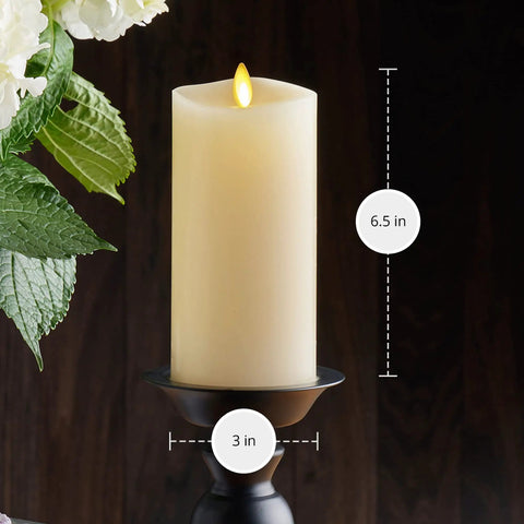 Realistic Moving Flame Pillar Candle With Flameless LED Lights, Unscented Ivory, on black holder with greenery, 3 in x 6.5 in