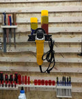 Iron Build Spray Bottle Rack Wall Mount Organizer for Garage with auto detailing supplies and tools visible. Heavy duty setup.
