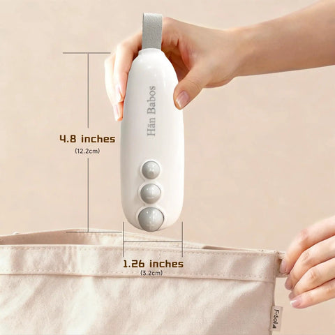 Hand holding a 4.8-inch white 2 In 1 Bag Sealer With Cutter Portable Rechargeable Heat Sealer With Magnetic over a bag
