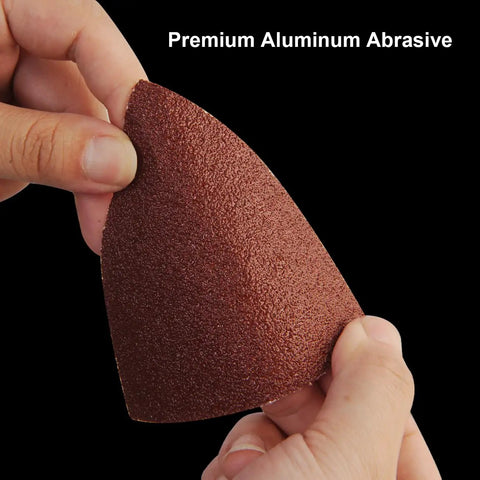 Person holding a 120 Sheet Sandpaper Set For Mouse Detail Sander And Finger Sander With Hook And Loop Holes 60 120 180 240 Grit piece