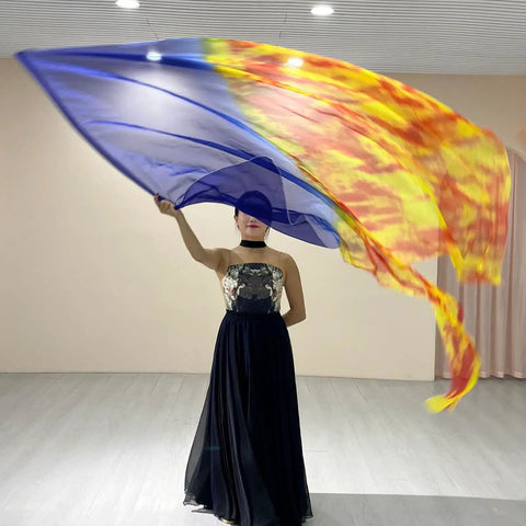 Grab These Awesome Worship Flags For Dance With Soft Chiffon Fabric And Flexible Rods twirled elegantly by a performer in a flowing black dress.
