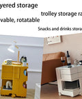 Ultra Slim Two Tier Rolling Utility Cart Smooth Glide Swivel Wheels Compact Abs Shelving Unit in yellow and white, fitted for snacks.