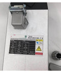 Close-up of the Beefy 7.5KW 10HP 220V CNC Spindle Motor Kit label and ER32 chuck showing specifications and air cooling feature for milling.