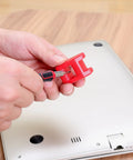 Person using 77 Piece Precision Tool Kit with Magnetic Screwdriver on electronics for repairs, showcasing CR-V steel bits.