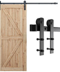 Wooden door with visible 7ft Barn Door Hardware Kit, I shape hanger, black sliding door track, carbon steel, nylon rollers.