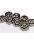 8 Skateboard Chrome Steel Open Ball bearing - Nylon Cage arranged in a row, showcasing their high-quality steel construction.