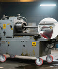 8 inch heavy duty industrial locking casters set of 4 with polyurethane swivel plate design on a lathe machine.