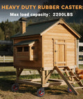 8 inch Heavy Duty Rubber Caster wheels set of 4 supporting a chicken coop on grass with a maximum load capacity of 2200 lbs.