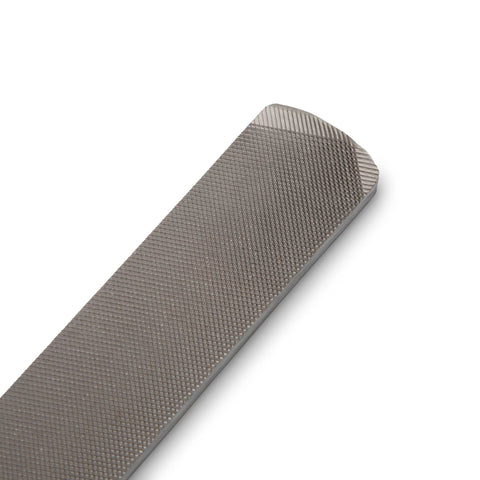 Close-up of an 8 Inch Rectangular Axe File With Double Cut Roughing Side And Single Cut Finishing Edge For Fast Sharpening Of Axes And Garden Tools