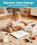 Child using 24 Quart Clear Plastic Craft Organizer with six detachable inserts for organizing markers and crayons on a playroom floor.