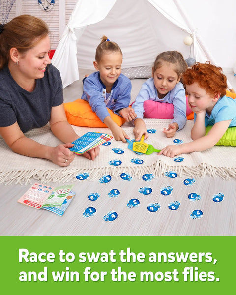 Children playing Swat The Fly Cards Math Game Set For Kids Seven Fun Math Games with math cards and swatter on the floor.