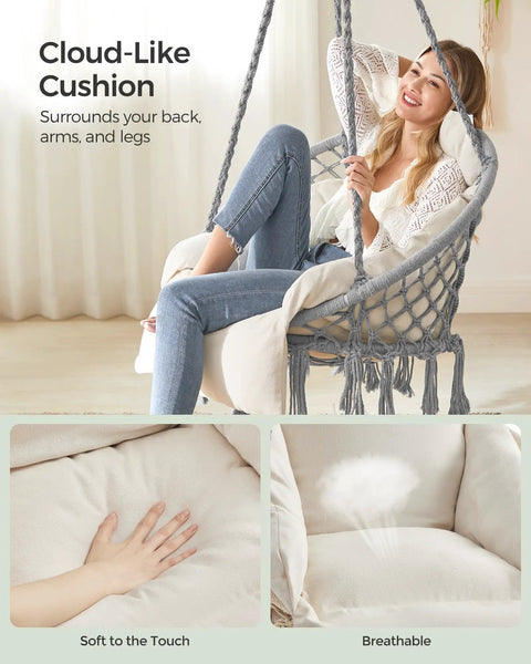 Woman sitting in Comfy Hammock Chair With Large Thick Cushion, Boho Swing Chair for Bedroom, Patio or Garden, Dove Gray and Cream White.