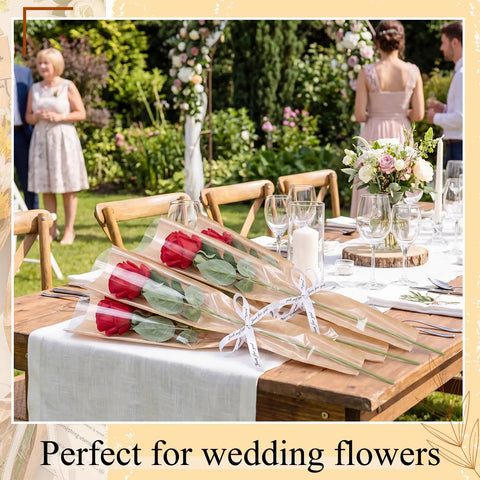 150 Pack Rose Sleeve Bouquet Bags Kraft Paper Backed With Plastic Front for weddings on decorated table