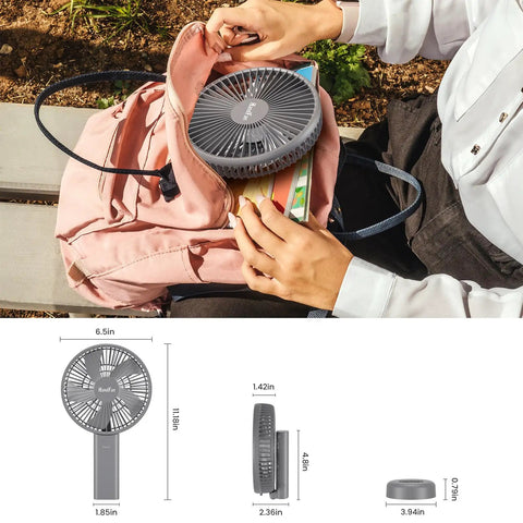 Person placing Ultra Quiet 6 Inch Handheld Personal Fan With 6 Speeds Rechargeable Battery into a pink backpack on a bench.