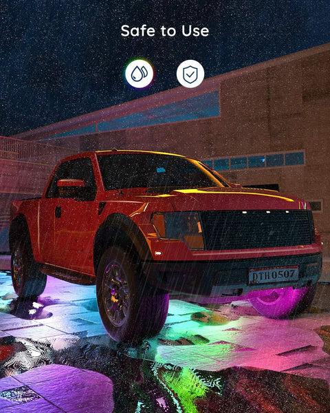 Truck showcasing Underglow Car Lights Kit With RGBIC LED Strips, 16 Million Colors, 10 Scene Modes, neon accents in rain
