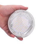 Hand holding Eight Watt LED Flood Light For Outdoor Landscape And Pool 12V DC AC Waterproof IP65 Underwater 6000K Day White Flood Lamp Twelve Pack