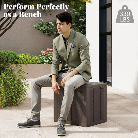 Man sitting on 30 Gallon Outdoor Storage Box Bench With Lockable Lid Waterproof Resin Deck Box For Garden Tools Pool Accessories