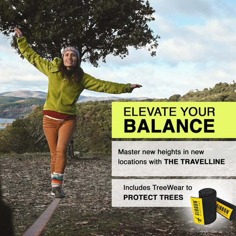 Person balancing on On-The-Go Slackline Kit With TreeWear Included in nature, showcasing 41-foot line with TreeWear protection.