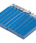 Ten blue 1/4-inch carbide-tipped lathe cutters with silver tips, arranged in a row