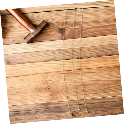 Get Your Sealer Back In Action With This Top Notch Heat Sealer Element Replacement Strip shown with silver Nichrome wires on wood.