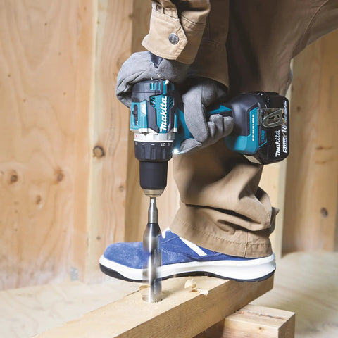Person using Top Shelf 18V Lithium Ion Brushless Drill Driver With Electric Brake Led Work Light And 21 Torque Settings on wood.